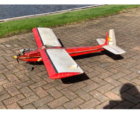 A radio controlled model plane, with a Irvine 40 engine, removable wings reveal servos, with model pilot in cockpit, 170cm wi