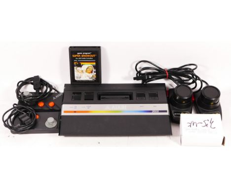 A Atari 2600 console (serial No X1063969925), with power cable, two paddle controllers and two Atari two button controllers, 