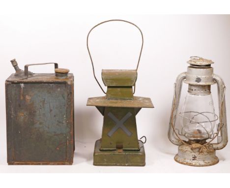 A pagoda style M.O.D. railway warning lamp, stamped Min Of Supply, together with a oil can and a Tilley lamp (3)