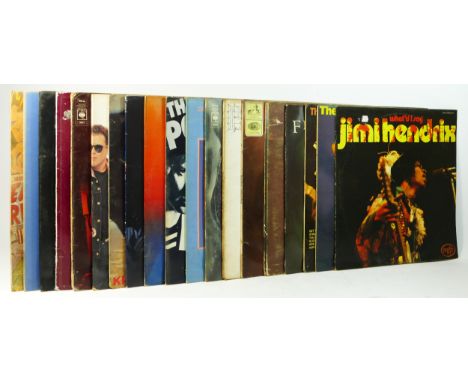 Nineteen rock / alternative vinyl LPs to include Dire Straits - Communique, Eric Clapton - The Cream Of, Eric Clapton - Anoth