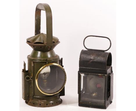 A green War Dept 3 aspect handlamp, complete with burner, together with a small unmarked hand lantern, with burner (2) 