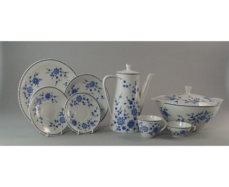 A Seltmann porcelain part dinner and coffee service, printed to the centres with blue and white stylised flowers within  bord