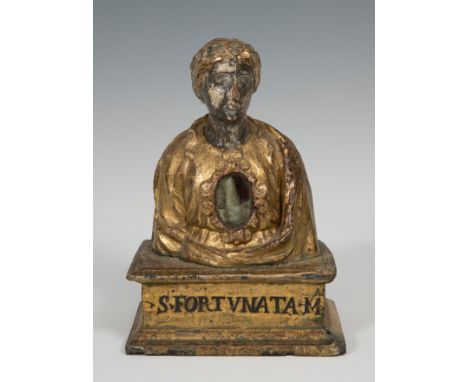 Reliquary of Saint Fortunata. Spain or Naples, 16th century.Carved, gilded and corollated wood.It presents faults, restoratio