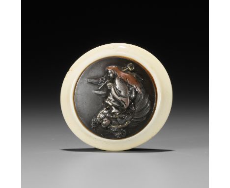 A KAGAMIBUTA NETSUKE OF A SHOJO ON MINOGAMEUnsignedJapan, late 19th centuryThe shibuichi disc fitted into a neatly polished, 