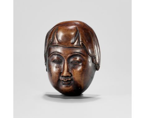 MASUMITSU: A LARGE WOOD MASK NETSUKE OF A BOYBy Masumitsu, signed Masumitsu 升光Japan, Edo/Tokyo, second half of 19th centuryFi
