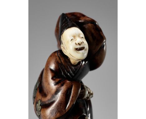 GYOKKEI: A FINE INLAID WOOD NETSUKE OF A SAMBASO DANCERBy Gyokkei, signed Gyokkei 玉珪Japan, Tokyo, second half of 19th century