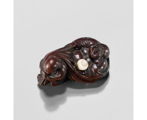 GYOKUMINSAI: A WOOD EDO SCHOOL NETSUKE OF A KARAKO PULLING HOTEI INSIDE HIS TREASURE BAGBy Gyokuminsai, signed Gyokuminsai 玉民