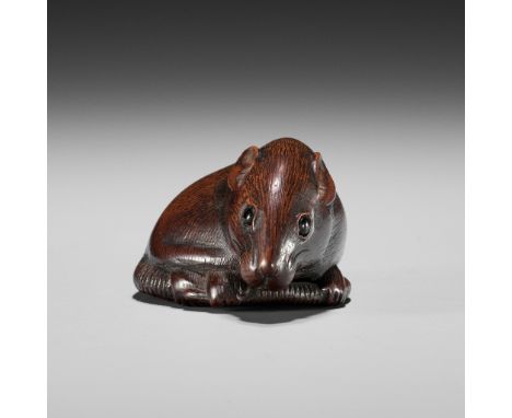 TOMOKAZU: A FINE WOOD NETSUKE OF A RATBy Tomokazu, signed Tomokazu 友一Japan, Gifu, early 19th century, Edo period (1615-1868)F