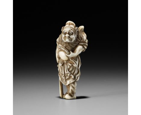 AN IVORY NETSUKE OF SHOKIUnsignedJapan, first half of 19th century, Edo period (1615-1868)The demon queller standing with his