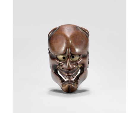 DEME UMAN: A WOOD MASK NETSUKE OF KIJOBy Deme Uman, signed Deme Uman 出目右滿Japan, Edo (Tokyo), early 19th century, Edo period (