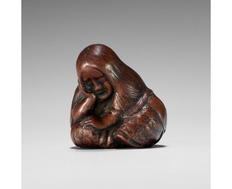 TOSHIKAZU: A NAGOYA SCHOOL WOOD NETSUKE OF A SEATED SLEEPING SHOJOBy Toshikazu, signed Toshikazu 利一Japan, Nagoya, 19th centur