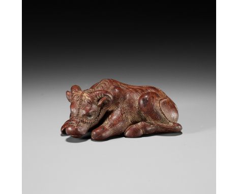 TAMETAKA: A WOOD NETSUKE OF A RECUMBENT OXSigned Tametaka 為隆Japan, Nagoya, late 18th to early 19th century, Edo period (1615-