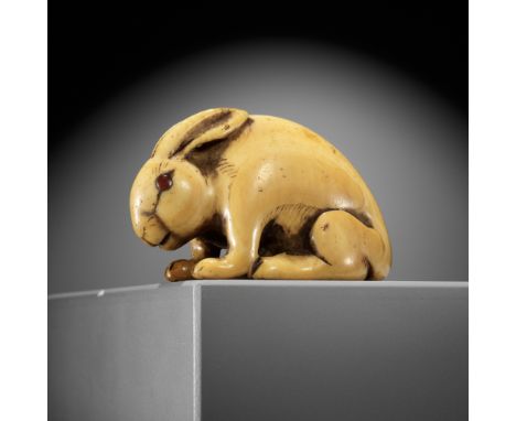 A LARGE KYOTO SCHOOL IVORY NETSUKE OF A RABBITUnsignedJapan, Kyoto, 18th century, Edo period (1615-1868)The hare (usagi) seat