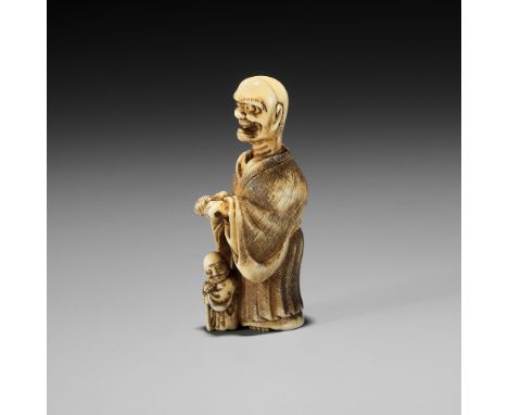 SHURAKU: A RARE IVORY NETSUKE OF A ROKUROKUBI SCARING A BLIND MANBy Shuraku, signed Shuraku 秀樂Japan, Edo (Tokyo), mid-19th ce