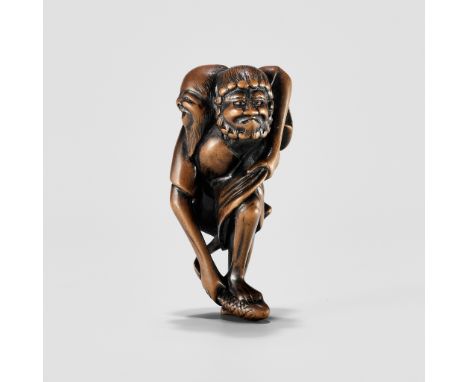 A WOOD NETSUKE OF ASHINAGA AND TENAGA CATCHING A FISHUnsignedJapan, 19th century, Edo period (1615-1868)The symbiotic pair of
