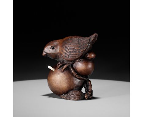 ALEXANDER DERKACHENKO: A WOOD NETSUKE OF A SPARROW ON A GOURDBy Alexander Derkachenko, signed with the artist's markUkraine, 