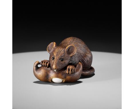 ALEXANDER DERKACHENKO: A WOOD NETSUKE OF A RAT WITH A BEAN-PODBy Alexander Derkachenko, signed with the artist's markUkraine,