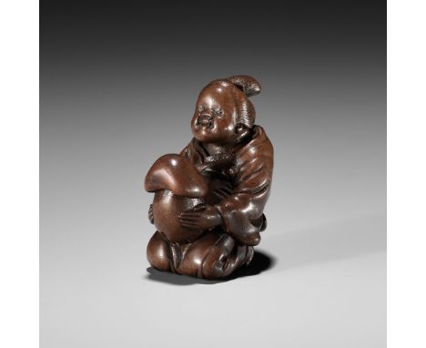 A FINE NAGOYA SCHOOL SHUNGA WOOD NETSUKE OF OKAME CRADLING A HUGE MUSHROOMUnsignedJapan, Nagoya, early 19th century, Edo peri