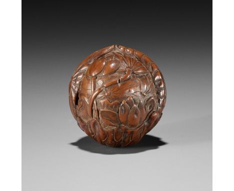 MASAHIDE: A FINE KURUMI (WALNUT) NETSUKE DEPICTING LOTUSBy Sakiyo Kurokawa Masahide, signed Masahide 正英Japan, Nagasaki, mid-1