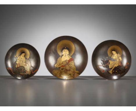 KAJIKAWA: A SUPERB SET OF THREE LACQUER SAKE SAUCERS DEPICTING BUDDHA AND THE BODHISATTVAS MONJU (MANJUSHRI) AND FUGEN (SAMAN