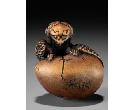 TOYOYO: A WOOD NETSUKE OF A HATCHING TENGU (TENGU NO TOMAGO)By Toyoyo (Toyoyasu, 1811-1883), signed Toyoyo 豊容Japan, Sasayama,