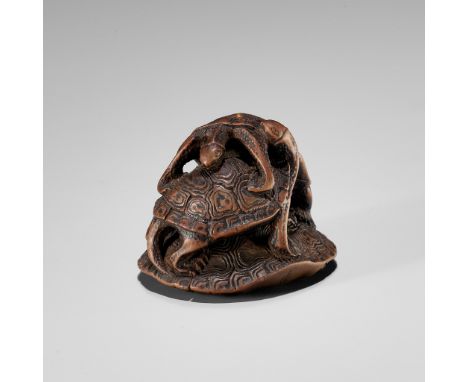 SEIGYOKU: A WOOD NETSUKE OF THREE TURTLES IN A PYRAMIDBy Seigyoku, signed Seigyoku 清玉Japan, Edo (Tokyo), mid-19th century, Ed