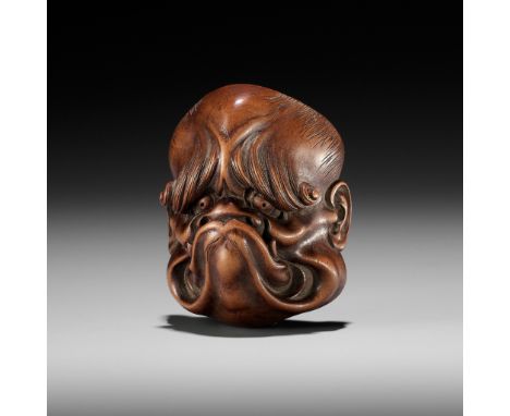 A FINE SANSHO-STYLE WOOD NETSUKE OF A GHOULUnsignedJapan, late 19th to early 20th century, Meiji period (1868-1912)Carved as 