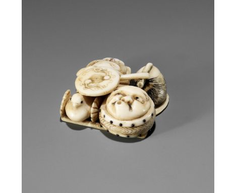 A WALRUS TUSK NETSUKE OF A GROUP OF NOH THEATRE ACCOUTREMENTSUnsignedJapan, c. 1860Including a shishimai mask, a hyottoko mas