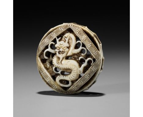 A FINE WALRUS IVORY RYUSA MANJU NETSUKE WITH DRAGONUnsignedJapan, Tokyo, Asakusa District, second half of 19th centuryPublish