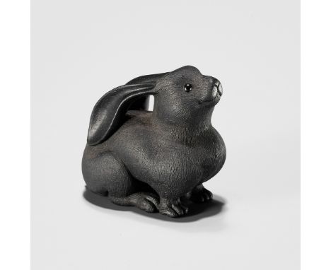 VADYM PYVOVAR: AN EBONY WOOD NETSUKE OF A HARE AFTER TOYOMASABy Vadym Pyvovar, signed with the artist's markUkraine, 2023Well
