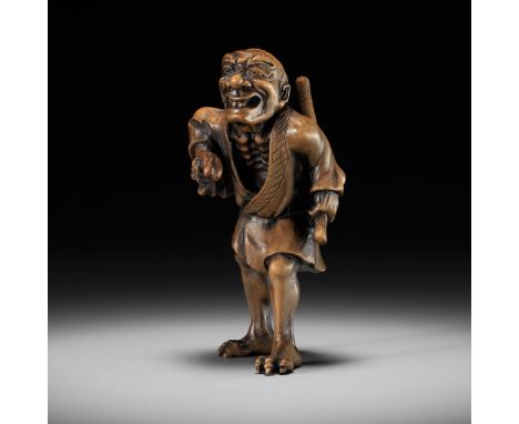 A HIGHLY UNUSUAL WOOD NETSUKE OF A SHAPESHIFTERUnsigned Japan, late 19th to early 20th century, Meiji period (1868-1912)Power