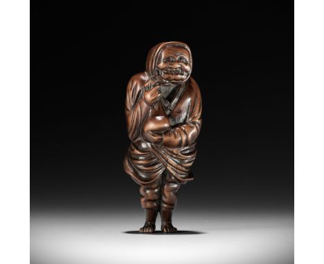 A SUPERB AND LARGE OSAKA SCHOOL WOOD NETSUKE OF A PEASANTUnsignedJapan, Osaka, late 18th to early 19th century, Edo period (1