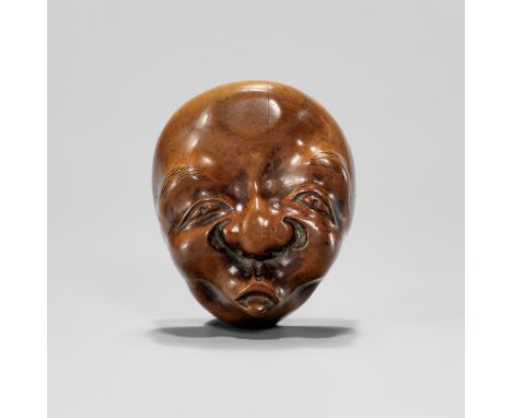 A RARE SHUNGA MASK NETSUKE OF HYOTTOKOUnsignedJapan, 19th century, Edo period (1615-1868)An unusual wood mask netsuke of the 