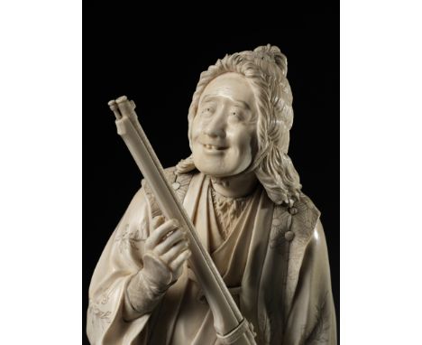 MASAMITSU: A RARE AND LARGE TOKYO SCHOOL IVORY OKIMONO OF A HUNTER WITH MATCHLOCK RIFLE (TANEGASHIMA)By Masamitsu, signed Mas