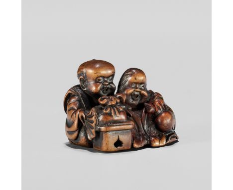 HIDESADA: A FINE WOOD NETSUKE OF OKAME AND FUKUSUKEBy Hidesada, signed Hidesada 秀貞Japan, 19th century, Edo period (1615-1868)