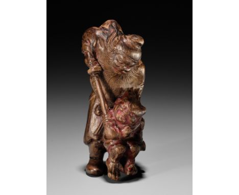 A POWERFUL SAISHIKI NETSUKE OF SHOKI AND ONI, STYLE OF YOSHIMURA SHUZANJapan, Osaka, 18th century, Edo period (1615-1868)Bold