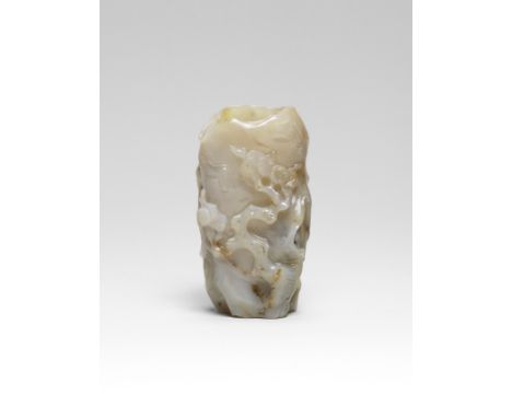 A CARVED AGATE 'PINE TRUNK' VASE18th centuryOf cylindrical form with an irregular mouth rim, finely carved around the exterio