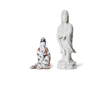 TWO BLANC-DE-CHINE FIGURES OF GUANYIN17th/18th centuryOne modelled as a seated figure of Guanyin with her left hand resting o