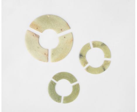 THREE SETS OF ARCHAIC JADE TRIPLE-CRESCENT-SHAPED PLAQUES, HUANGWestern Zhou DynastyEach plaque of flat arc shape, with holes