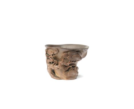 A BAMBOO 'PINE AND CRANES' LIBATION CUP17th/18th centuryOf naturalistic form, modelled as a knotted trunk section, carved in 