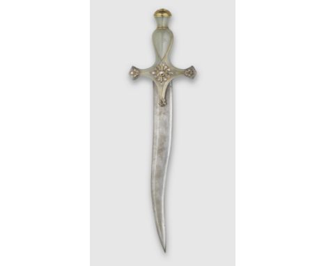 A MUGHAL PALE GREEN JADE-HANDLED GEMSTONE-INLAID DAGGER18th/19th centuryThe pale green jade hilt of pistol-grip form with swe