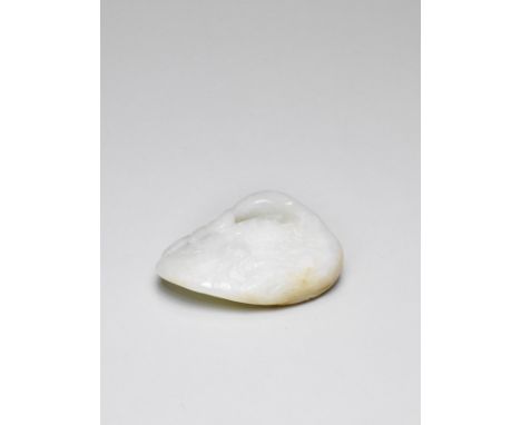 A FINE WHITE AND RUSSET JADE 'GOOSE AND YOUNG' PAPERWEIGHT18th century The pebble smoothly carved as a goose with finely-inci