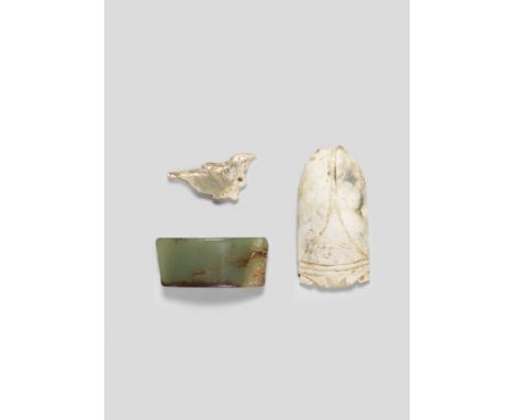 A RARE ARCHAIC JADE CARVING OF A BIRDWestern Zhou DynastyOf flattened stylised form, with an aperture drilled at the breast, 