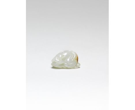 A FINE SMALL WHITE AND RUSSET JADE 'QILIN, BAT AND COINS' GROUP18th centuryThe small pebble smoothly carved as a recumbent my