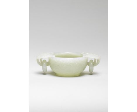 A FINE PALE GREEN JADE DOUBLE-HANDLED BOWL18th century The compressed globular body rising from a ring foot, finely carved in