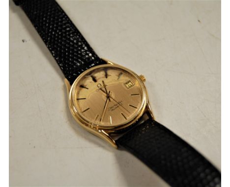 A gentleman's Omega Seamaster wristwatch, the brushed gilt dial with baton numerals and hands, calendar function, quartz move