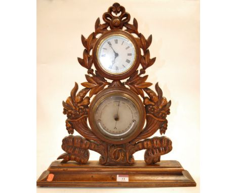 A late 19th century continental walnut mantel clock barometer, the clock with white enamel dial and watch movement, the barom