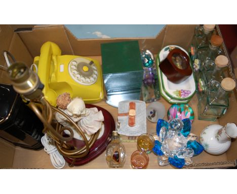 A box of miscellaneous items to include figural table lamp, telephone, Aynsley Wild Tudor vase, glass paperweights etc