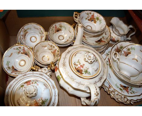 A Victorian part tea service, on a cream ground decorated with pagoda amongst flowers, heightened in gilt   Condition Report 