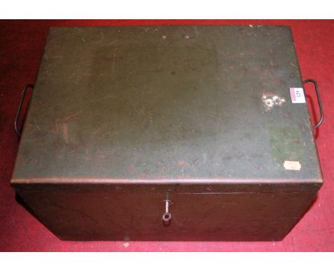 A mid-20th century green painted tin trunk, of rectangular form, having hinged lid and folding carry handles